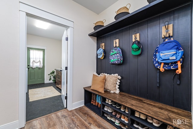 mudroom featuring dark wood-type flooring