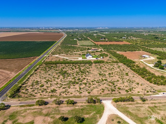 birds eye view of property featuring a rural view