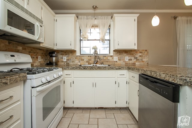 140 Van Zandt St, San Angelo, TX 76905 - kitchen with white appliances, a sink, white cabinets, decorative backsplash, and crown molding