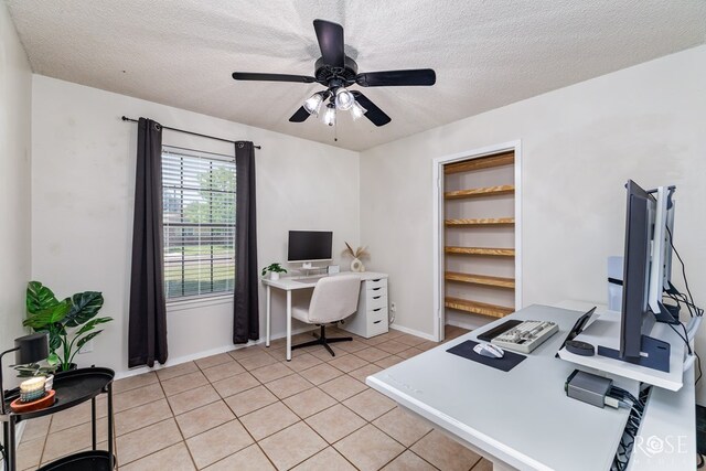 140 Van Zandt St, San Angelo, TX 76905 - office area with ceiling fan, light tile patterned floors, a textured ceiling, and baseboards