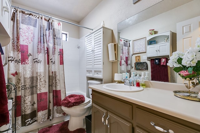 full bathroom featuring vanity, shower / bath combo, and toilet