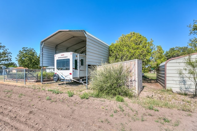 view of outdoor structure with a carport