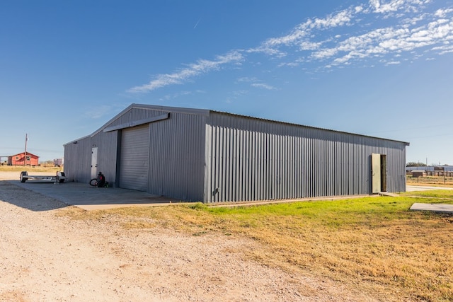 view of outdoor structure featuring a garage