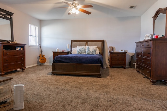 bedroom with light carpet and ceiling fan