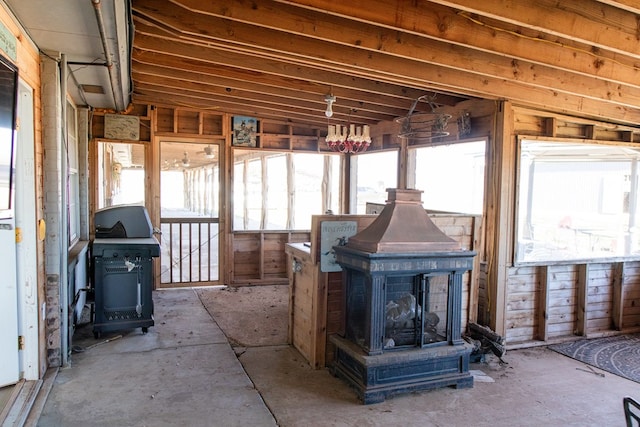 miscellaneous room featuring a wood stove