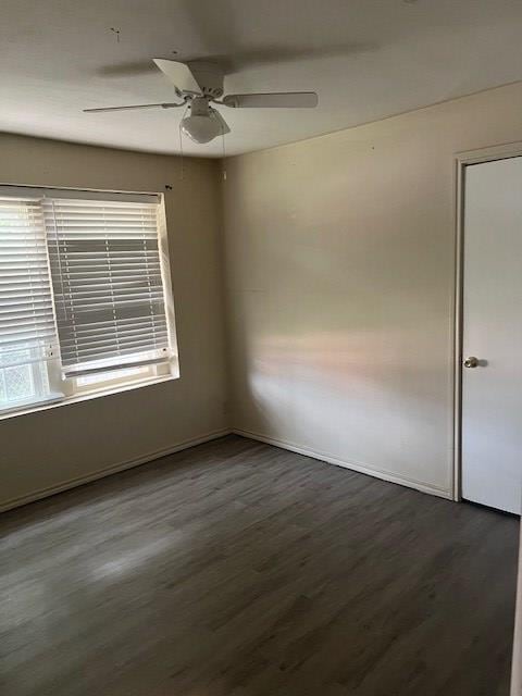 24 E 18th St, San Angelo, TX 76903 - empty room featuring baseboards, a ceiling fan, and wood finished floors
