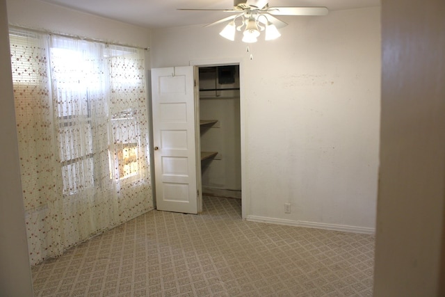 1008 10th St, Ballinger, TX 76821 - unfurnished bedroom featuring a closet and a ceiling fan