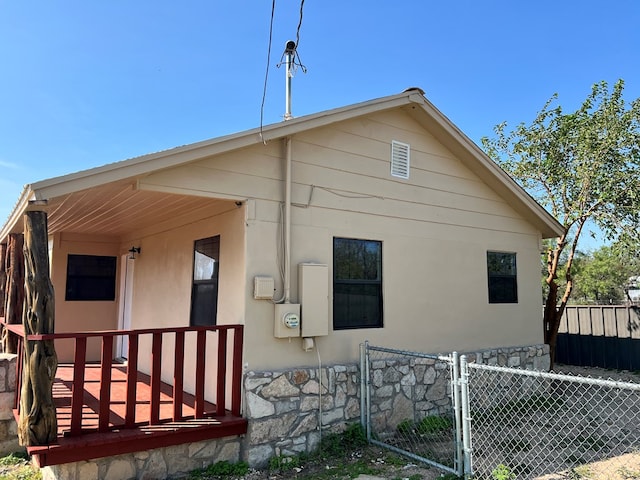 415 Montague Ave, San Angelo, TX 76905 - view of home's exterior with a gate and stucco siding