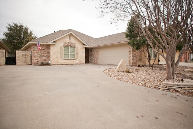 single story home with a garage