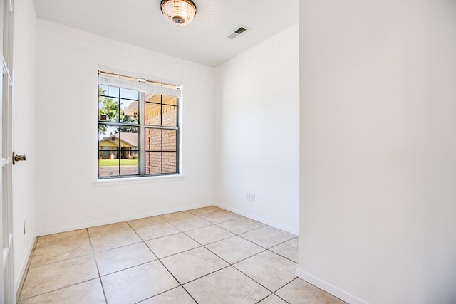1617 Idaho Ave, San Angelo, TX 76904 - empty room with light tile patterned floors