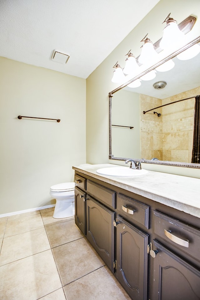 1617 Idaho Ave, San Angelo, TX 76904 - bathroom featuring tile patterned flooring, vanity, and a shower with curtain