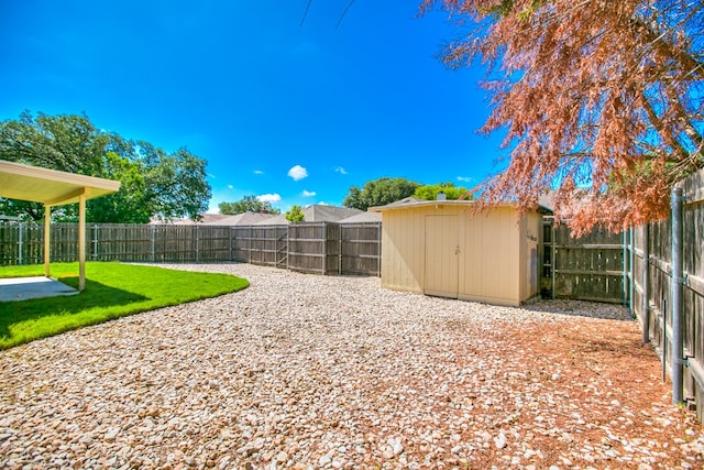 1617 Idaho Ave, San Angelo, TX 76904 - fenced backyard with a shed and a patio