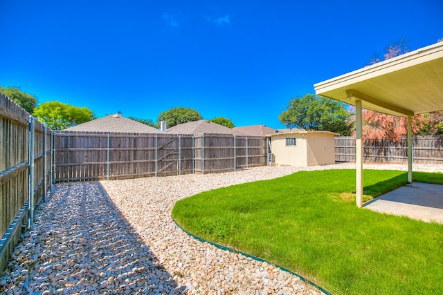 1617 Idaho Ave, San Angelo, TX 76904 - fenced backyard featuring a patio area