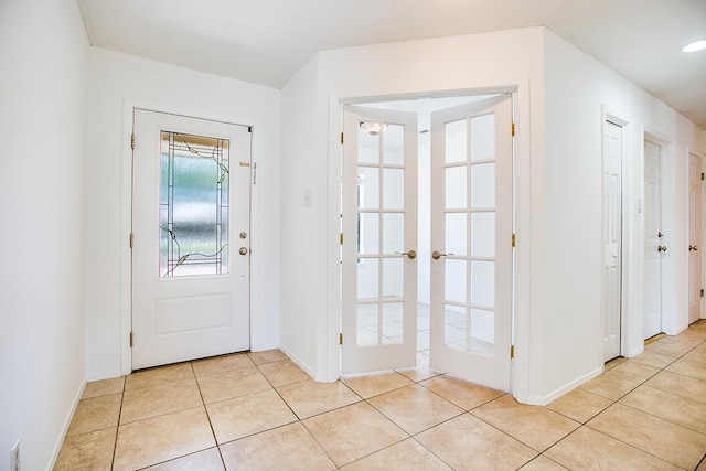1617 Idaho Ave, San Angelo, TX 76904 - foyer entrance with light tile patterned flooring and french doors