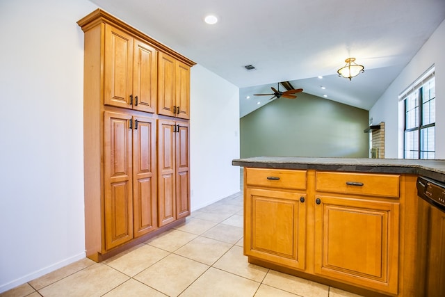 1617 Idaho Ave, San Angelo, TX 76904 - kitchen featuring stainless steel dishwasher, a ceiling fan, vaulted ceiling, brown cabinets, and light tile patterned floors