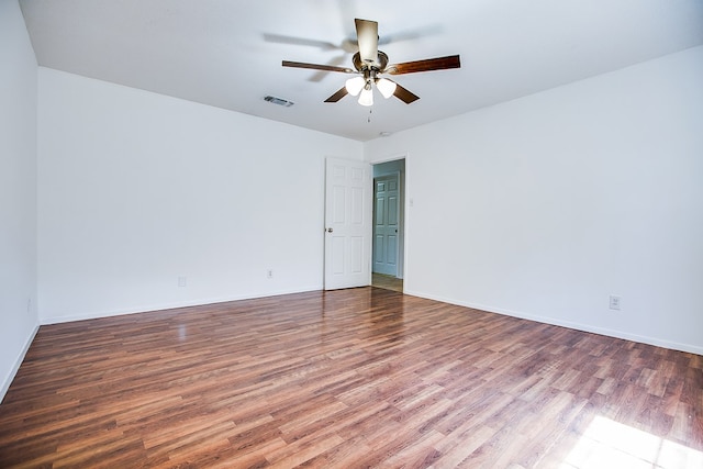 1617 Idaho Ave, San Angelo, TX 76904 - empty room with wood finished floors and a ceiling fan