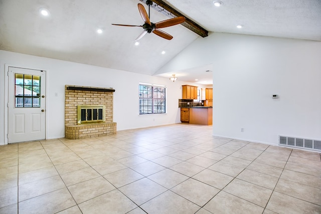1617 Idaho Ave, San Angelo, TX 76904 - unfurnished living room with beamed ceiling, a ceiling fan, recessed lighting, high vaulted ceiling, and light tile patterned floors