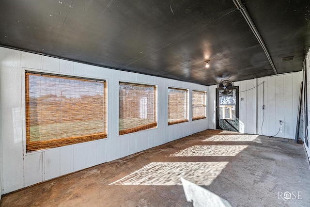 spare room featuring concrete floors