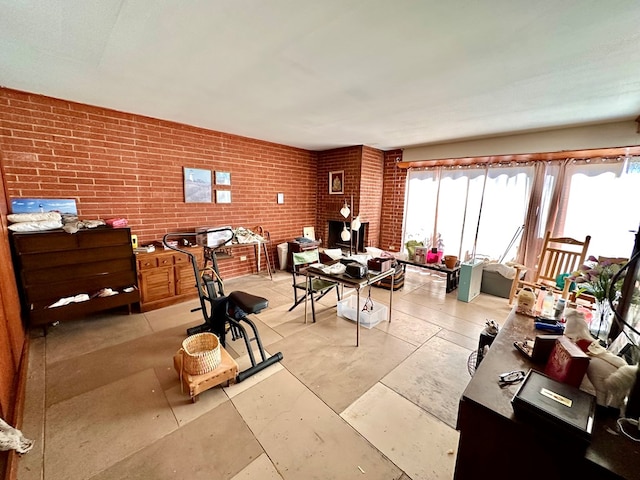 interior space featuring brick wall