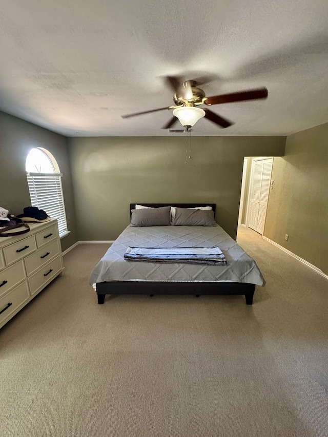 5214 Green Valley Trl, San Angelo, TX 76904 - bedroom featuring light colored carpet and ceiling fan