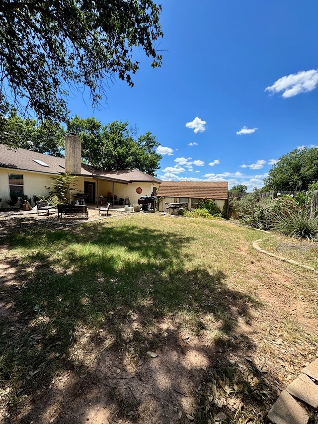 5214 Green Valley Trl, San Angelo, TX 76904 - view of green lawn featuring a patio area