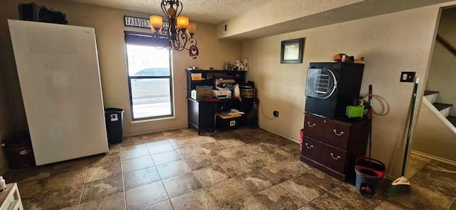 1210 Elizabeth St, Rankin, TX 79778 - dining area featuring stairs, a textured ceiling, and a chandelier