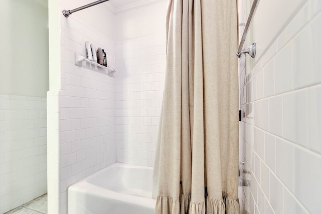 2805 Alta Vista Ln, San Angelo, TX 76904 - bathroom featuring crown molding, tile walls, and shower / tub combo