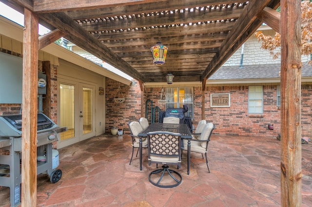 2805 Alta Vista Ln, San Angelo, TX 76904 - view of patio with french doors, outdoor dining area, and a grill