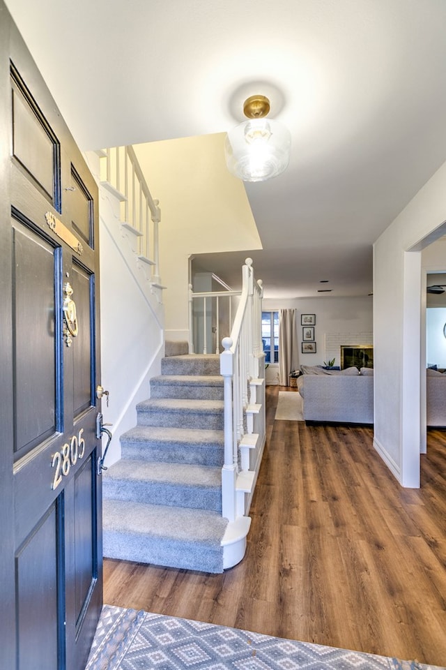 2805 Alta Vista Ln, San Angelo, TX 76904 - foyer featuring stairs and wood finished floors
