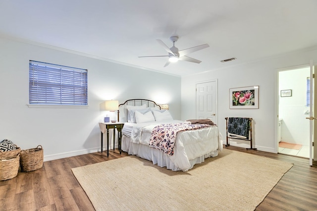 2805 Alta Vista Ln, San Angelo, TX 76904 - bedroom with wood finished floors, ornamental molding, ceiling fan, and a closet