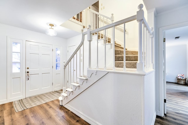 2805 Alta Vista Ln, San Angelo, TX 76904 - foyer with wood finished floors, stairs, and ornamental molding