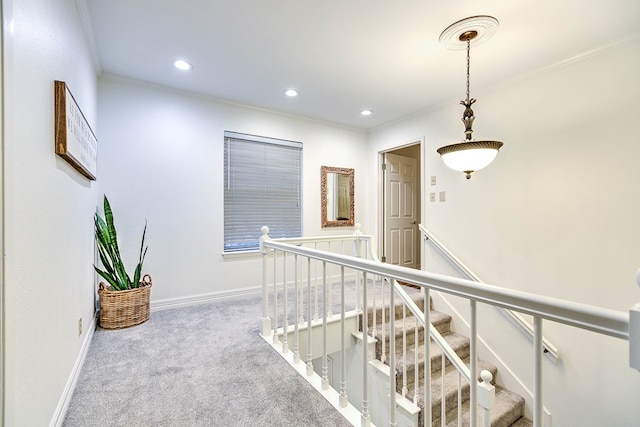 2805 Alta Vista Ln, San Angelo, TX 76904 - hall with carpet floors, an upstairs landing, recessed lighting, and crown molding