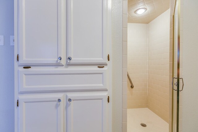 bathroom featuring an enclosed shower