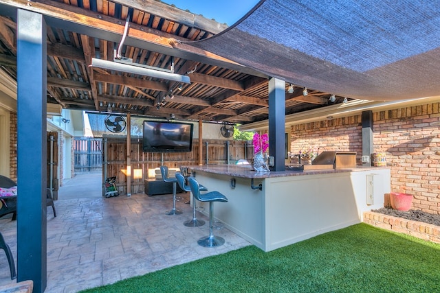 view of patio / terrace with exterior kitchen