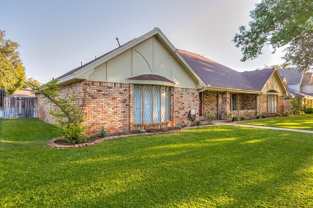 view of front of home with a front yard