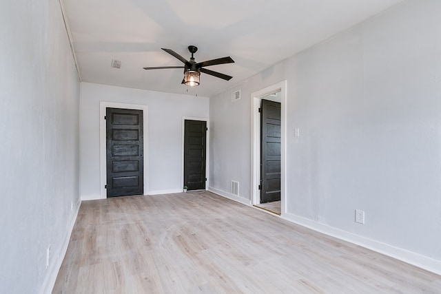 1016 N Campus Blvd, San Angelo, TX 76901 - spare room with ceiling fan, light wood-type flooring, and baseboards