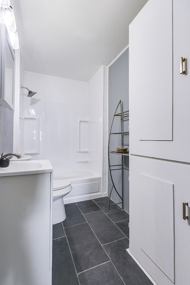 1016 N Campus Blvd, San Angelo, TX 76901 - full bathroom with vanity, toilet, shower / tub combination, and tile patterned floors