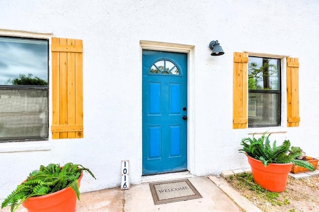 1016 N Campus Blvd, San Angelo, TX 76901 - property entrance featuring stucco siding
