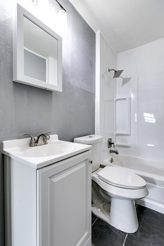 1016 N Campus Blvd, San Angelo, TX 76901 - full bathroom with shower / bathtub combination, vanity, a textured wall, and toilet