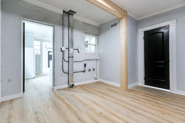 1016 N Campus Blvd, San Angelo, TX 76901 - bathroom with ornamental molding, wood finished floors, and baseboards