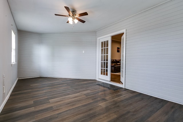 interior space with french doors and ceiling fan