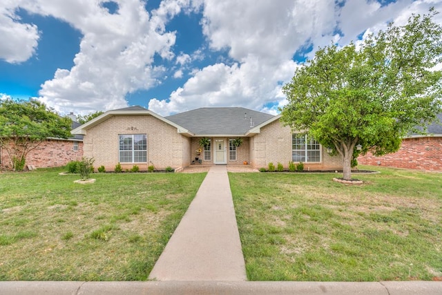 4929 Royal Oak Dr, San Angelo, TX 76904 - ranch-style home with a front lawn