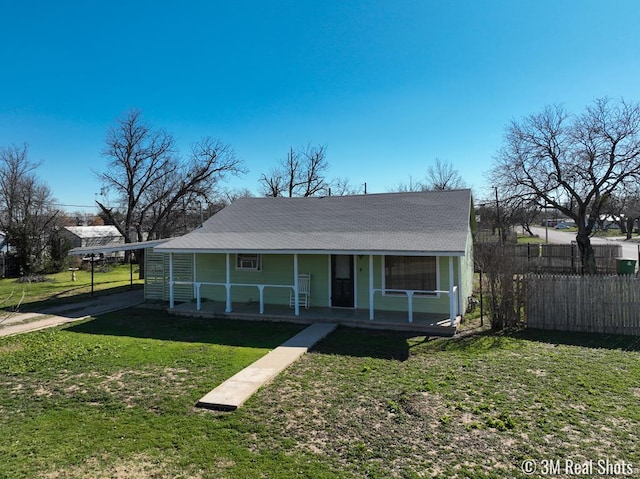 view of front of home featuring a front yard and a porch