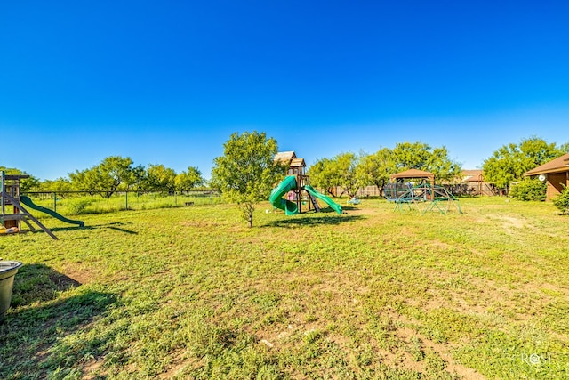 view of yard with a playground