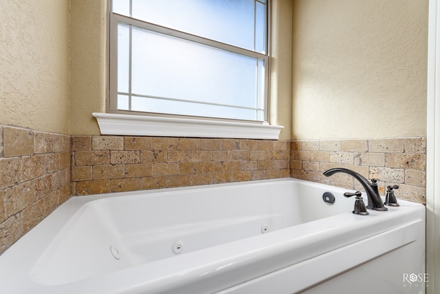 bathroom featuring a tub