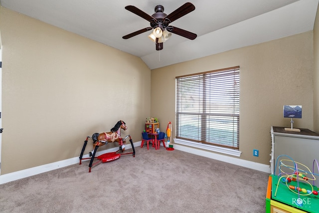 rec room featuring ceiling fan, lofted ceiling, and light carpet