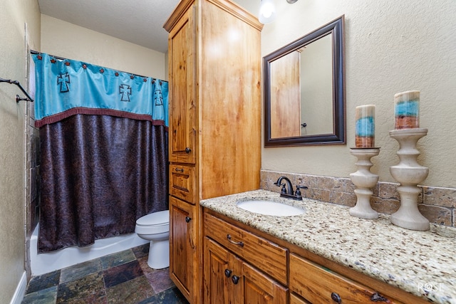 full bathroom featuring vanity, toilet, and shower / bath combo with shower curtain