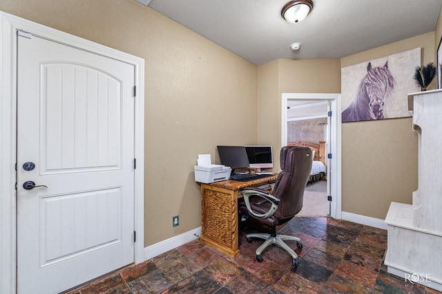 office featuring a textured ceiling