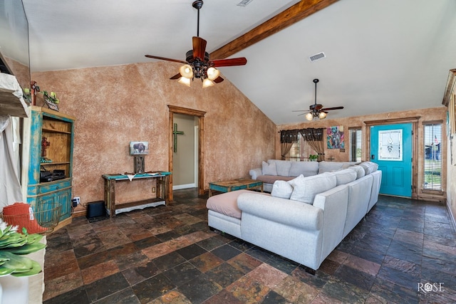 living room featuring beamed ceiling, ceiling fan, and high vaulted ceiling