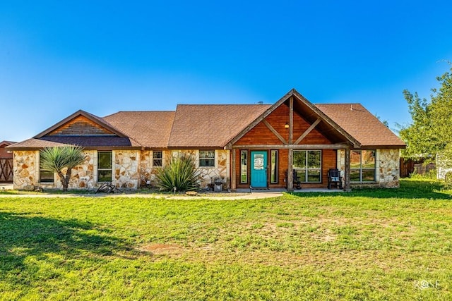 view of front of home with a front yard